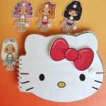 Toca boca Kitty con un lazo rojo